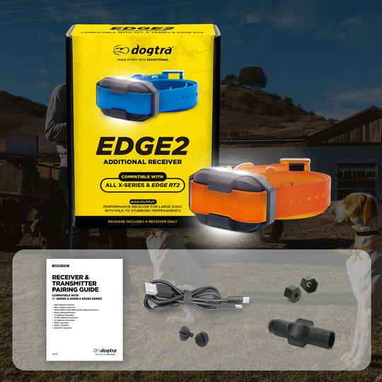 Dogtra EDGE2 orange additional receiver packaging with dog collar and box contents behind a natural background